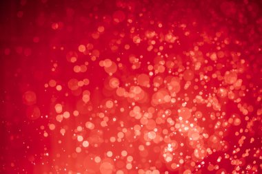 Soyut kırmızı noel simli ışıklar Bokeh arkaplanının odaklanmasını engeller