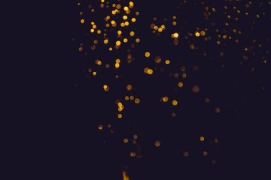 Soyut altın defocus bokeh simli vintage ışıklar siyah arkaplan