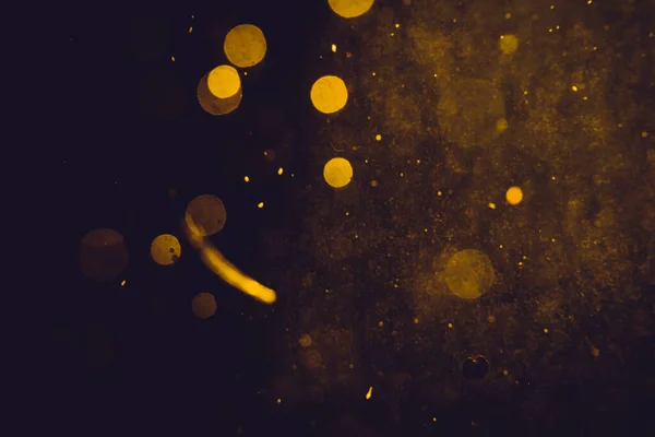 Brillo Bokeh Dark Abstract Gold Sobre Fondo Negro — Foto de Stock