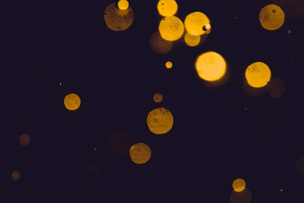 Brillo Bokeh Dark Abstract Gold Sobre Fondo Negro —  Fotos de Stock