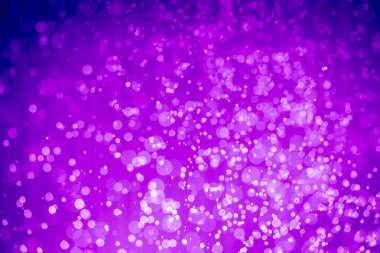 Soyut menekşe mor parıltılı ışıklar Odaklanmış bokeh arkaplanı