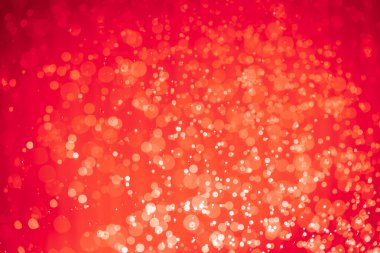 Soyut kırmızı noel simli ışıklar Bokeh arkaplanının odaklanmasını engeller