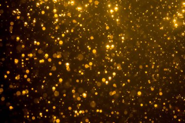 Mutlu Noeller ve yeni yıl arkaplanı için altın rengi parıltılı ışıklar soyut bokeh