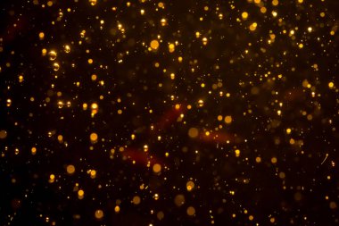 Mutlu Noeller ve yeni yıl arkaplanı için altın rengi parıltılı ışıklar soyut bokeh