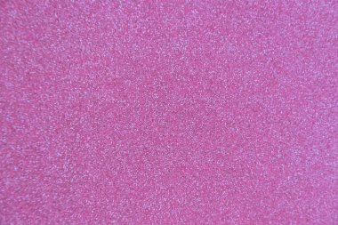 Güzel, parlak, pembe, parıltılı bir dokuma Noel arkaplanı.