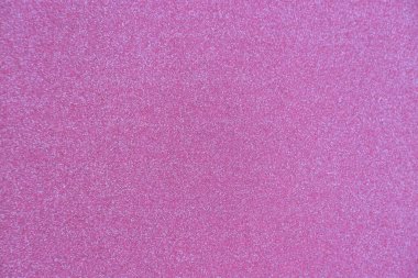 Güzel, parlak, pembe, parıltılı bir dokuma Noel arkaplanı.