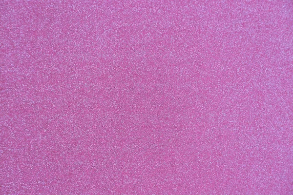 Güzel, parlak, pembe, parıltılı bir dokuma Noel arkaplanı.