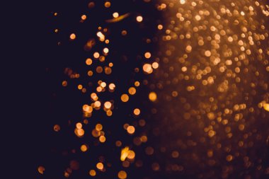 Soyut altın defocus bokeh simli vintage ışıklar siyah arkaplan