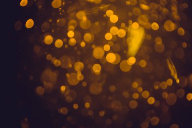 Soyut altın defocus bokeh simli vintage ışıklar siyah arkaplan