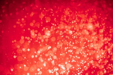 Soyut kırmızı noel simli ışıklar Bokeh arkaplanının odaklanmasını engeller