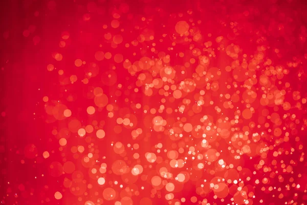 Soyut kırmızı noel simli ışıklar Bokeh arkaplanının odaklanmasını engeller