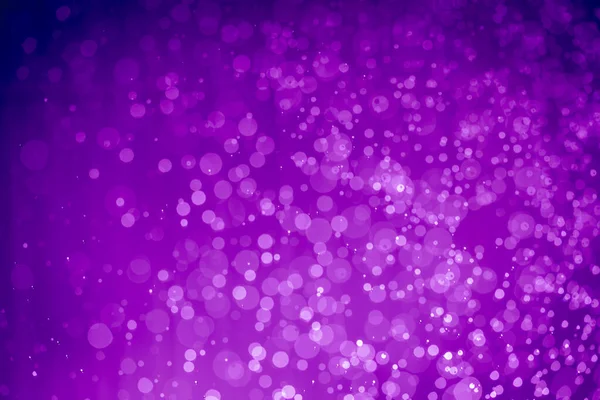 Soyut menekşe mor parıltılı ışıklar Odaklanmış bokeh arkaplanı