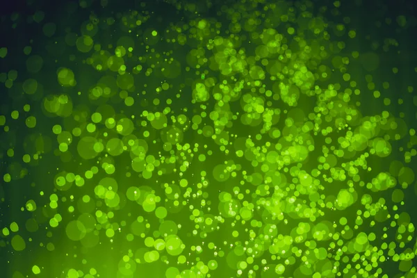 Soyut Yeşil Noel Parıltısı Işıklar Odaklanmamış Bokeh arkaplanı