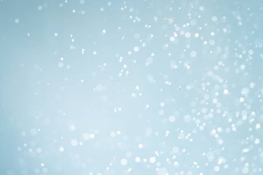 Mavi arkaplan ile soyut beyaz bokeh