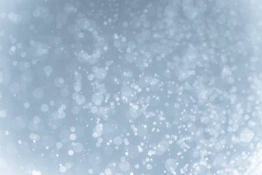 Mavi arkaplan ile soyut beyaz bokeh