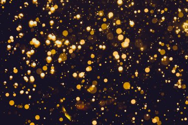 Siyah arkaplan ile soyut altın bokeh