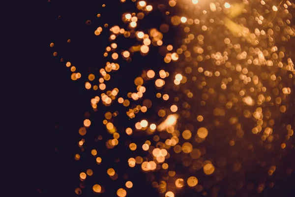 Soyut altın defocus bokeh simli vintage ışıklar siyah arkaplan