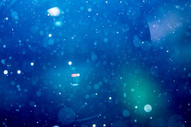 Fantezi soyut bulanık mavi ışık bokeh renkli parlak arka plan kullanımı
