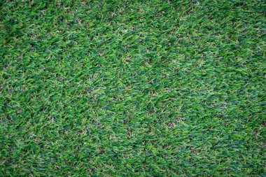 Yeşil yapay çim zemin arka planı