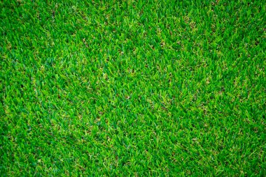 Yeşil yapay çim zemin arka planı