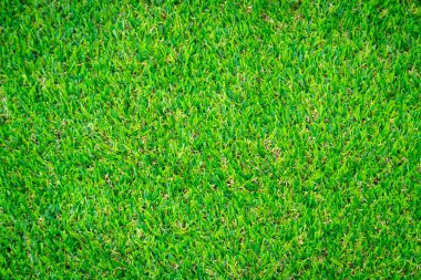 Yeşil yapay çim zemin arka planı