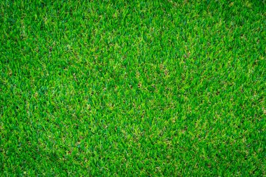 Yeşil yapay çim zemin arka planı