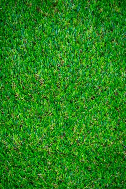 Yeşil yapay çim zemin arka planı