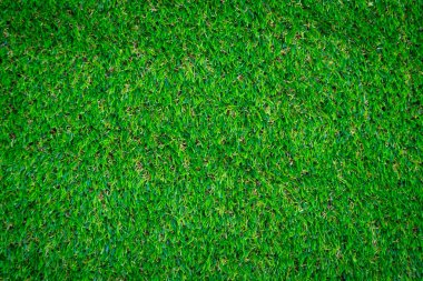 Yeşil yapay çim zemin arka planı