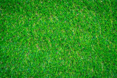 Yeşil yapay çim zemin arka planı
