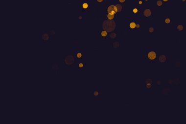 Fantezi altın bokeh siyah arkaplanda ışıktan parıldıyor