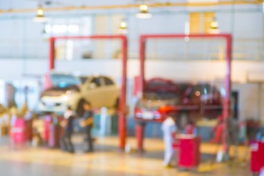 Blur Cars to repair and check the distance at the service center with bokeh background