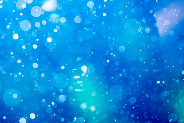 Fantezi soyut bulanık mavi ışık bokeh renkli parlak arka plan kullanımı