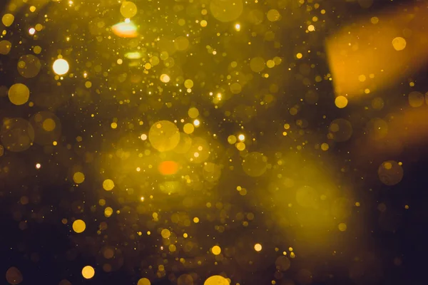 Fantezi soyut bulanık altın ışık bokeh renkli ışıltı arka plan kullanımı