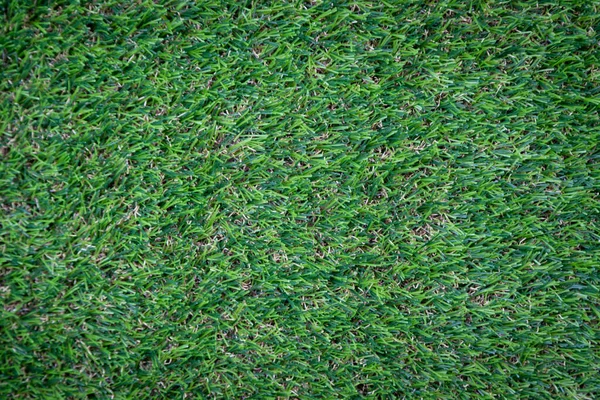 Yeşil yapay çim zemin arka planı
