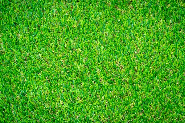 Yeşil yapay çim zemin arka planı