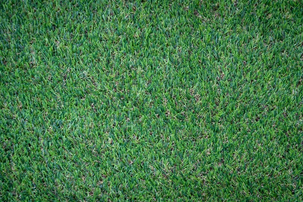 Yeşil yapay çim zemin arka planı