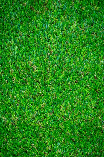 Yeşil yapay çim zemin arka planı