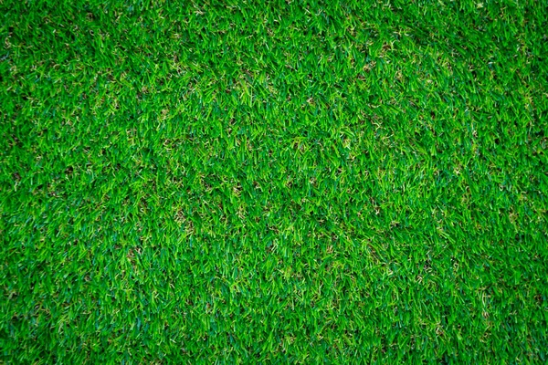 Yeşil yapay çim zemin arka planı