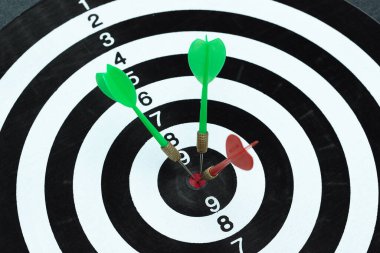 Successful business planning with a goal that has an arrow in the center of the target.