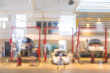 Blur Cars to repair and check the distance at the service center with bokeh background