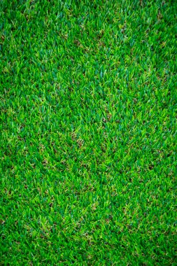 Yeşil yapay çim zemin arka planı