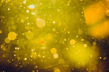 Fantezi soyut bulanık altın ışık bokeh renkli ışıltı arka plan kullanımı
