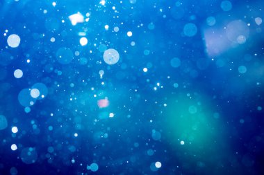 Fantezi soyut bulanık mavi ışık bokeh renkli parlak arka plan kullanımı