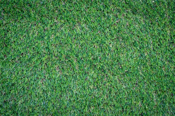 Yeşil yapay çim zemin arka planı