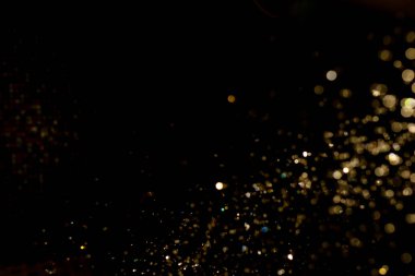 Siyah arkaplanda ışık bokeh