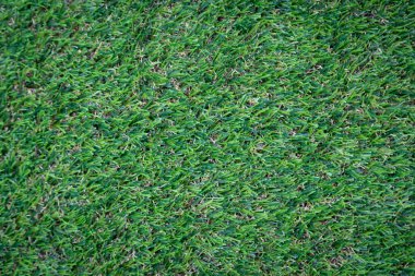 Yeşil yapay çim zemin arka planı