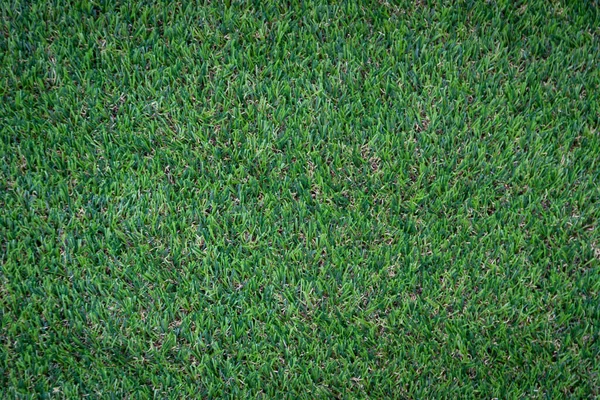 Yeşil yapay çim zemin arka planı
