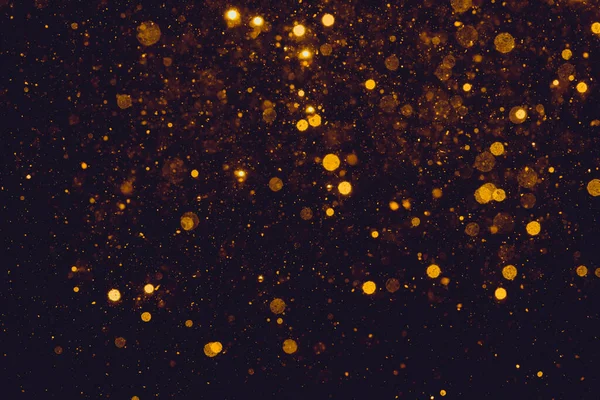 Bokeh Ouro Luzes Sobre Fundo Preto — Fotografia de Stock