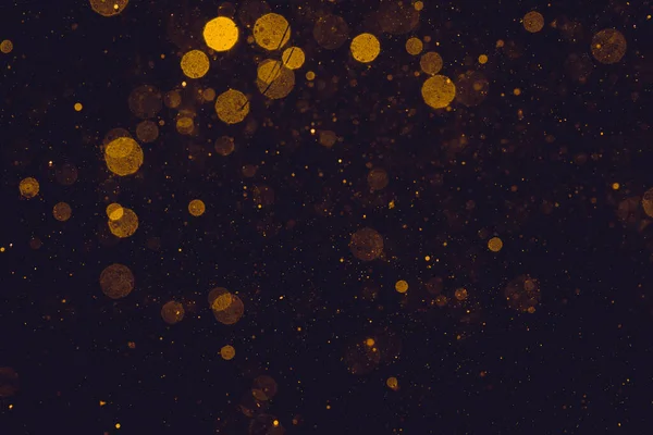 Gold Bokeh Lights Black Background — Stok fotoğraf