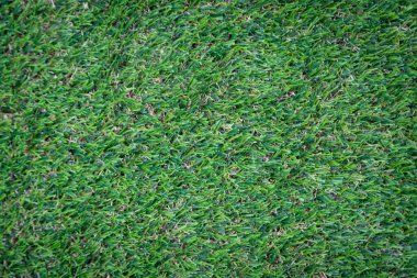 Yeşil yapay çim zemin arka planı